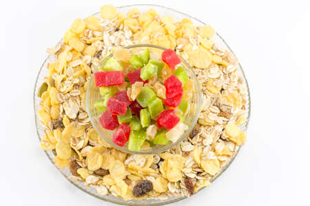 Muesli and dried fruit arranged in glass bowlsの写真素材