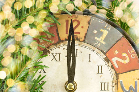 Vintage clock and shiny holidays lights