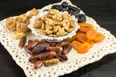 Christmas Eve dry fruit offerings served on the tableの写真素材