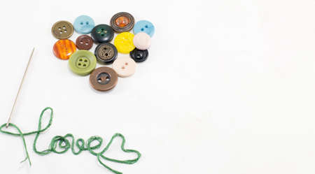 heart made out of colorful buttonsの写真素材