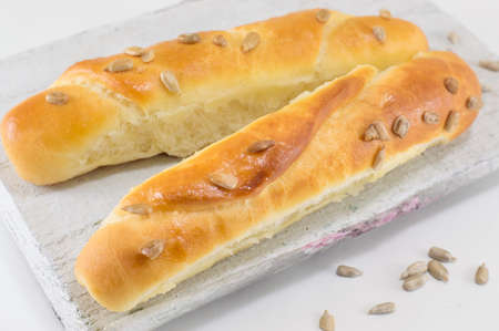 bunch of sesame pastry in a white crateの写真素材