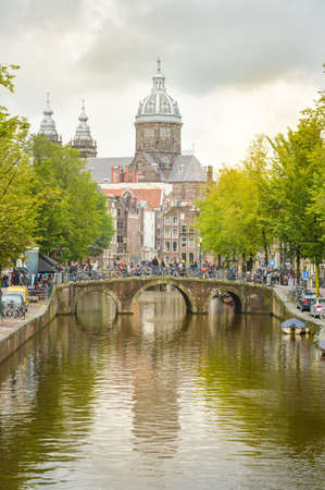 Amsterdam, the Netherlands -September 17, 2015: Canal and St. Nicolas Church in Amsterdam, capital and most populous city of the Netherlands.のeditorial素材