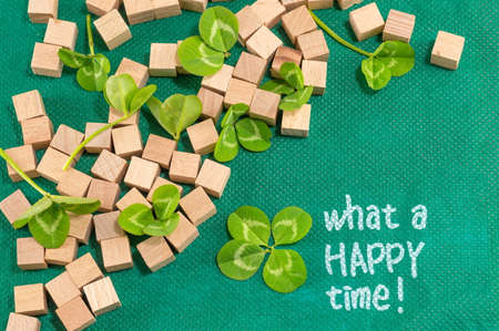 St. Patrick decoration with clover and small wooden cubes