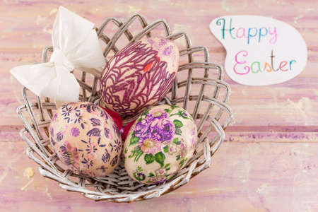 Happy Easter card with decoupage decorated Easter eggsの写真素材
