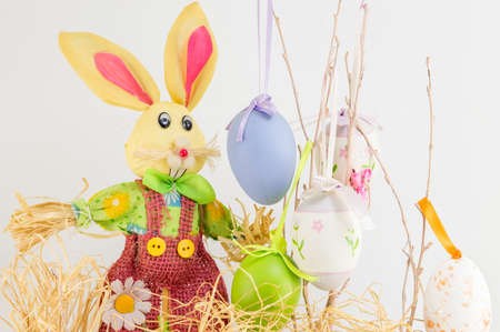 Easter bunny toy and decorated Easter eggs