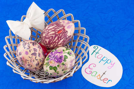 Happy Easter card with decoupage decorated Easter eggsの写真素材
