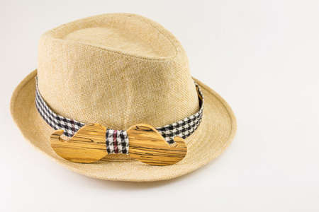 Wooden bow tie around a hat. Man accessoriesの写真素材