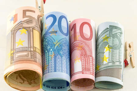 Rolled up euro bills