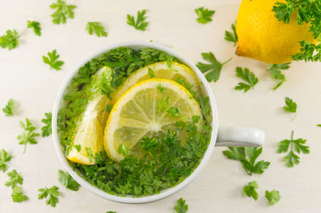 Water with parsley and lemon. Diet beverageの写真素材