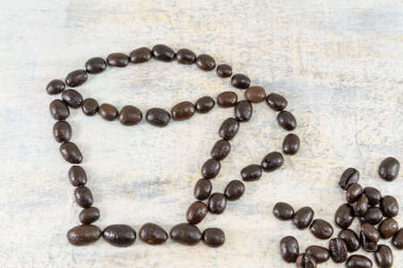 Coffee beans forming a coffee cupの写真素材