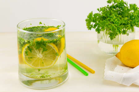 Water with parsley and lemon. Diet beverageの写真素材