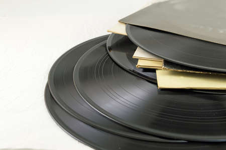 Old vinyl records on a pileの写真素材
