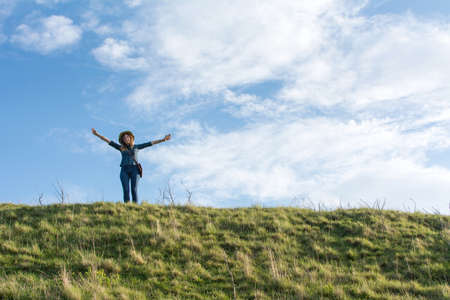 Happy hiker alone on the hill