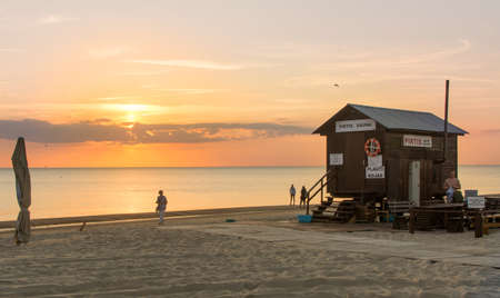 PALANGA LITHUANIA - JUNE 13: View at the Palanga sandy beach with lifeguard house. Palanga is the most popular summer resort in Lithuaniaのeditorial素材