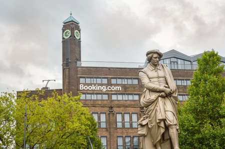 AMSTERDAM - SEPTEMBER 17, 2015: Rembrant monument in front of booking.com headquaters in famous Rembrant park in Amsterdamのeditorial素材