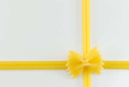 Spaghetti forming present box ribbon shape on a white backgroundの写真素材