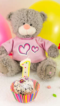 First birthday celebration party scene with cake and balloonsの写真素材