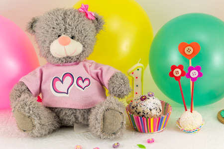 First birthday celebration party scene with cake and balloonsの写真素材