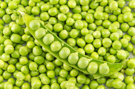 Fresh raw organic peas ready for cooking lunchの写真素材