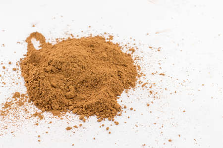 Bunch of cinnamon on a white kitchen tableの写真素材