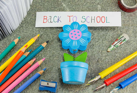 Back to school note held by a paper holder