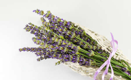 Lavender flower branches on a wooden tableの写真素材