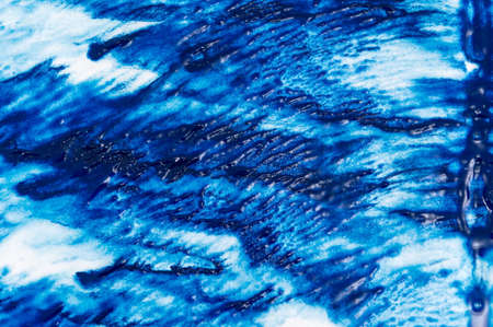 Photo of blue watercolor texture with brush strokesの写真素材