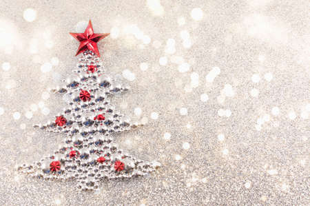 Christmas tree decoration with silver glitter background. Celebrating Christmasの写真素材