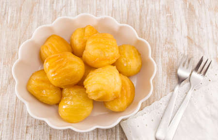 small pieces of tulumbe on a white plate