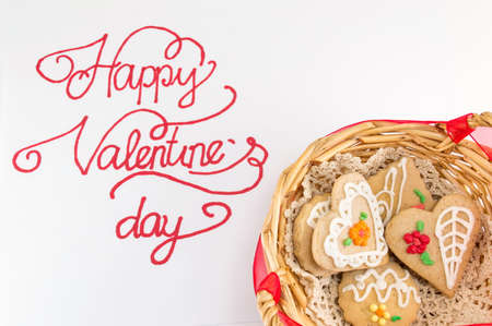 Happy Valentines day calligraphy card with heart shaped cookiesの写真素材