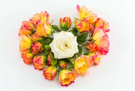 Heart shaped orange and white roses bouquetの写真素材