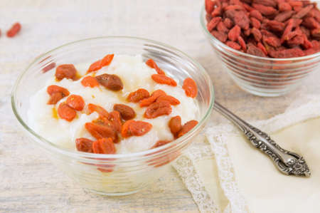 goji berries and rice dessert in a glass bowlの写真素材