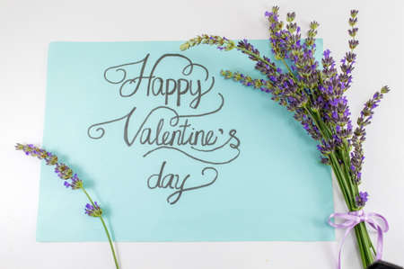 Happy Valentines day calligraphy card with lavender flowersの写真素材