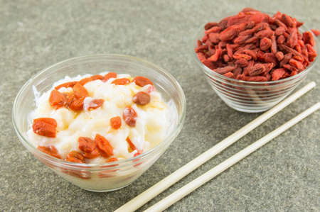 goji berries and rice dessert in a glass bowlの写真素材