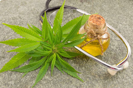 marijuana, cannabis oil and stethoscope. Alternative medicineの写真素材