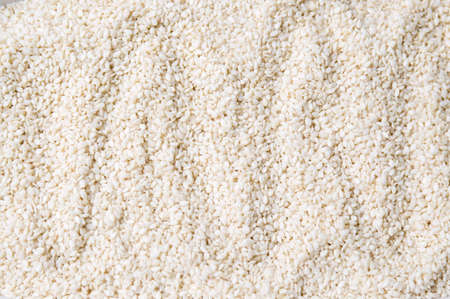 Heap of organic natural sesame seeds backgroundの写真素材