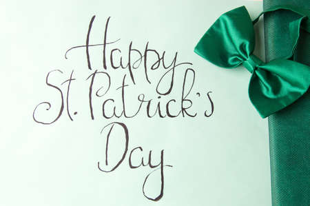 Happy St Patrick day calligraphy card and green accessories