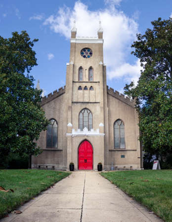 panorama of a church with red doors