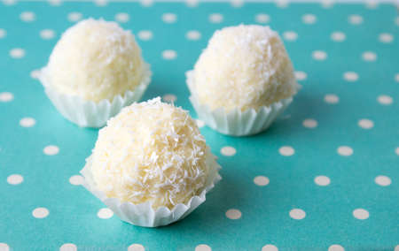 Coconut spread round cookies in paper holders