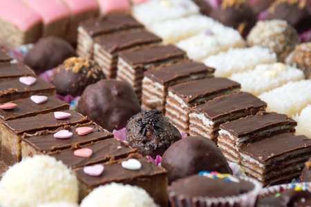 Various homemade sweet cookies decorated on a plateの写真素材
