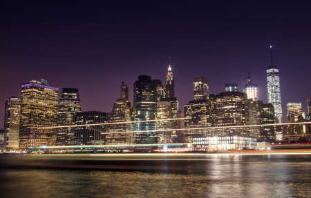 Famous Manhattan cityscape in New York with light trailsの写真素材