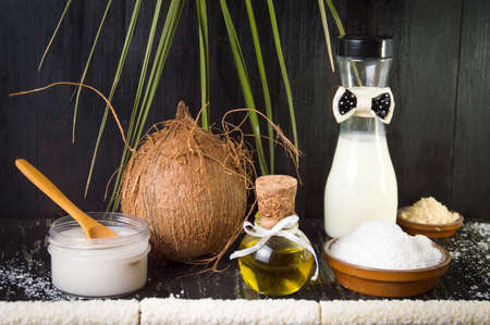 Various coconut products set on black backgroundの写真素材