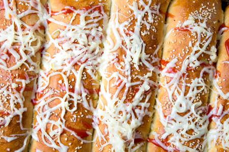 Homemade calzone pizza covered with cheese background