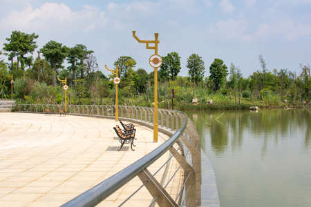 Peaceful Chinese park with a lake day view