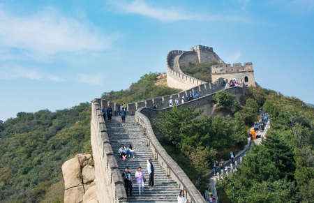 BEIJING, CHINA, SEPTEMBER,29, 2016: Tourists walking on the Great wall of China on a sunny day