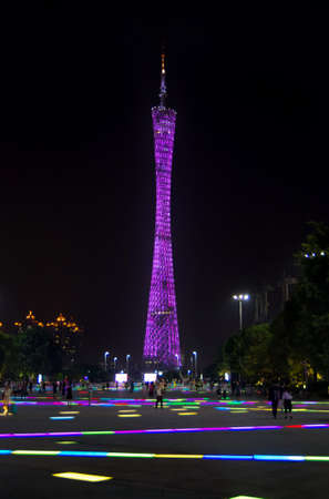 GUANGZHOU, CHINA - SEPTEMBER 13, 2016: Guangzhou Canton tower, and people on modern walking are,...