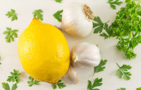 Lemon with garlic and parsley for healthy eatingの写真素材