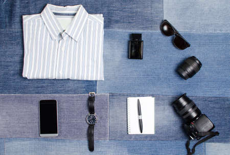 Male fashion accessories on denim background flatlayの写真素材