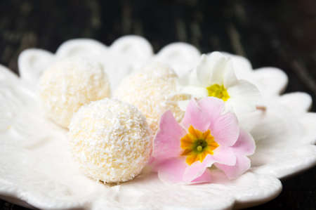 Coconut dessert sweet balls on a plateの写真素材