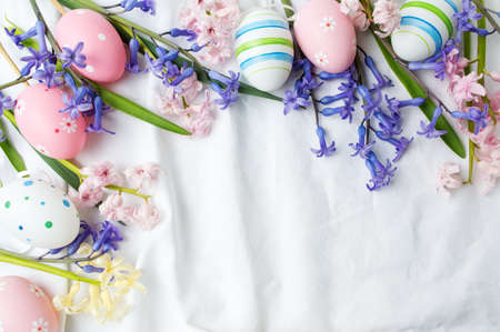 Painted Easter eggs and hyacinth flowers in bloomの写真素材